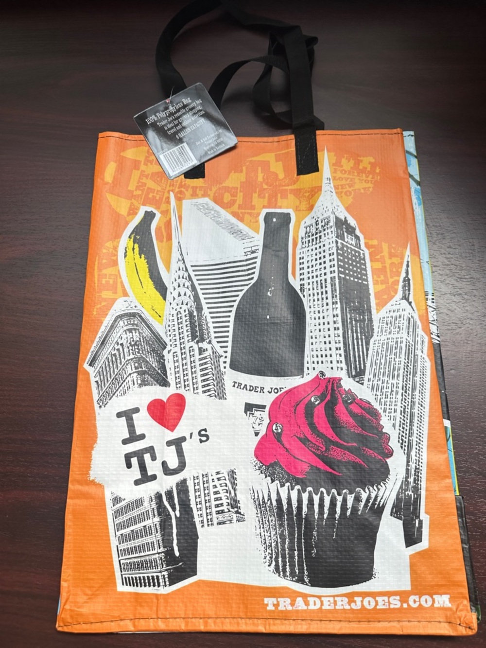 Trader Joe's New York Orange Shopper Tote Bag with Pink Cupcake Graphic